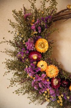 a wreath with dried flowers on it