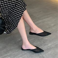 These Pointed Toe Mesh Dreaming Flats are sure to elevate your outfit of the day. Featuring a black fishnet material with a pointed toe design with a slip-on style, we're obsessed. Simply add to your everyday fit for an effortlessly chic combo.