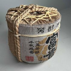 Beautiful reproduction of a large sake barrel with reeds and rope from the 1950s.    Dimensions: height 60 cm, diameter 58 cm.    This sake barrel served as a shop display in a Japanese store.    An authentic and decorative piece for Japan and sake enthusiasts. Japanese Ropes, Traditional Japanese Decor, Sake Barrel, Japanese Objects, Barrel Storage, Japanese Items, Friends Design, Barrel Table, Design Sketching