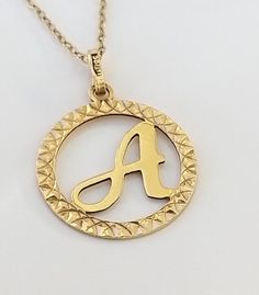 "A superb vintage letter \"A\" openwork solid gold pendant. The design is very fashionable and stylish perfect for a surprise gift to someone special. ▪ Overall Condition: Excellent ▪ Metal: Pendant 18ct Gold ▪ Metal: Chain 9ct Gold ▪ Pendant Width: 2.6cm ▪ Insurance Estimate: £1235 ▪ Marked: Stamped \"750\" & \"9k\" ▪ Payment Layaway Plan Available: Yes ▪ Full Detailed Appraisal: Quotation Available VIDEO:  As a qualified Gemmologist and Jeweller with over 20 years experience in the jewellery  industry, each jewel is chosen for its  'quality, beauty and interest'... As a Consultant in a contemporary jewellery gallery I was privileged to handle work by top Jewellers such as Shaun Leane, Malcolm Betts and Andrew Geoghegan, giving me a broad spectrum of knowledge on gemstones, metals and des Gold Monogram Necklace For Birthday Gift, Gold Monogram Jewelry For Birthday, Vintage Gold Jewelry For Birthday Gift, Surprise For Wife, Birthday Surprise For Wife, Vintage Gold Pendant, Anniversary Present, Vintage Lettering, Silver Lockets