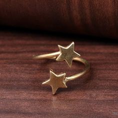 Gold Star ring, Midi star ring, Vintage ring, Celestial Ring, Modern ring, Adjustable ring, Gift for her, Delicate ring, Mothers day gift Material-Brass 1. Please share your numbers (in personalization box ) as required for shipping address details, and it'll help us to contact you easily. And don't worry about the privacy, we'll keep it safe with us, So try to cooperate with us. :) 2.Customers' satisfaction is our biggest priority, please contact us with any questions/queries for future or existing orders, and we will do our best to make sure you are happy with your order. 3.Please make sure to add the correct address during checkout. You can return your purchased item within 15 days after successful delivery. We offer a 100% "Money Back Guarantee" if you are not satisfied with your purch Adjustable Star-shaped Midi Rings As Gift, Celestial Star-shaped Midi Rings As Gift, Handmade Gold Star-shaped Ring, Handmade Star-shaped Rings For Anniversary, Handmade Gold Star Rings, Handmade Star-shaped Gold Rings, Christmas Ring, Celestial Ring, Chunky Rings