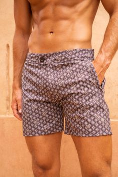 MODEL ELLIOTT IS 6'1 AND WEARS A SIZE MEDIUM - If you have a slim waist you may be better to take a size down (Elliott wears a large in our elasticated Atlantis shorts) Welcome to the Dubai Tailored swim shorts. Taking the elegant vibrations from the middle east, we exhibit the structure of our Tailored shorts and accentuated them with our gold waterflex zips, keeping branding to a minimum these shorts express their luxury through our specially formulated slightly stretch quick dry fabric that gives off a perfected custom Sink pattern using a ganache bottom layer, a gold sink logo outline layer and topped with an antique tile pattern giving a matte shine, something unlike anything you have seen before. Embroidered sink logo to the left leg & embossed front button closure for ultimate comfo Gold Sink, Logo Outline, Custom Sinks, Luxury Resort Wear, Swim Short, Tailored Shorts, Tile Pattern, The Middle East, Slim Waist