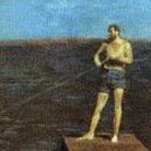 a man standing on top of a wooden platform in the ocean