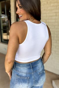 Stay stylish and stay cool in this Moving On Up White Halter Neck Crop Top. Made with a lightweight fabric, this comfortable top is perfect for days when temperatures soar! Keep it casual or dress it up - this top can take you anywhere! Fit: She is wearing her true size medium. Fits true to size. If in between sizes, size up Comfortable Fitted Crop Top, Casual Crop Top Tank For Day Out, Solid Stretch Tops For A Day Out, Stretch Solid Tops For Day Out, Spring Casual Crop Tank Top, White Stretch Summer Top, Solid Stretch Tops For Vacation, Casual Stretch Tank Crop Top, Solid Color Crop Top For Day Out