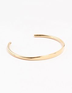 Upgrade your everyday style with our durable cuff bracelet, crafted from water-resistant gold-plated stainless steel. Its sleek, classic design ensures long-lasting elegance, ideal for effortless sophistication in any setting. Material: Gold Plated, Stainless Steel Dimensions: Diameter: 5.5 cm Length: 18 cm - Stretch Fit Width: 5 mm Waterproof pieces from this collection are crafted from stainless steel, meaning they're sweat, swim and shower resistant! | Lovisa Waterproof Gold Plated Stainless Classic Matte Gold Bracelet, Adjustable Gold-tone Classic Cuff Bracelet, Classic Adjustable Gold-tone Cuff Bracelet, Classic Gold Bangle For Everyday, Classic Gold-tone Bangle For Everyday, Classic Adjustable Open Cuff Bangle, Everyday Gold Cuff Bracelet, Classic Gold Cuff Bracelet, Sleek Adjustable Gold Jewelry