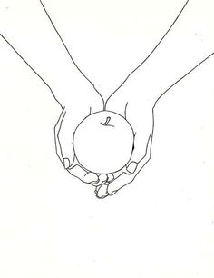 two hands holding an apple in the shape of a heart on top of each other