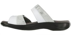 Nudu Slide is a slip-on version of the popular Nudu style. Two-toned leather and decorative stitching give this sandal unique style. A plush, contoured insole covered in soft microfiber cradles your foot's natural curves and arches. The leather straps are padded for ultimate comfort, and adjustable to let you tailor your fit.
Heel Height: 1.375". Leather Slides With Arch Support, Leather Slip-on Sandals With Arch Support, Comfortable Leather Slides With Arch Support, White Leather Slippers With Removable Insole, White Leather Sandals With Arch Support, White Leather Footbed Slippers, Sandal For Women, Unique Key, Sas Shoes