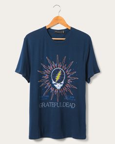 Featuring an iconic Steal Your Face Grateful Dead graphic on our signature, super soft Vintage Tee in faded blue color Outerspace, here is another tee for all those Deadheads out there! The multi-colored graphic sits front and center on the tee that has been given vintage destruction details, like grinding on the neck, hem and sleeve. Made of 100% lightweight cotton, this tee is relaxed and oversized. Shop our Grateful Dead Collection HERE and Music Collection HERE. Washed Blue Graphic Print T-shirt, Relaxed Fit, Washed Blue Graphic Tee With Screen Print, Washed Blue Graphic Tee With Graphic Print, Washed Blue Graphic Tee With Print, Blue Grunge Graphic Design Tops, Blue Grunge Top With Graphic Design, Blue Distressed Graphic Tee, Blue Grunge T-shirt With Graphic Print, Blue Grunge Graphic Print T-shirt