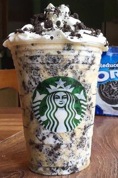 a cup of ice cream and oreo cookies