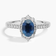 Timeless but chic, this elegant sapphire gemstone ring is adorned with diamonds down the sides, framed in 14k white gold. Pave Diamond Ring, Blue Nile, Sapphire Gemstone, Precious Gemstones, Pave Diamonds, Fashion Rings, Gemstone Jewelry, Sapphire, Gemstone Rings