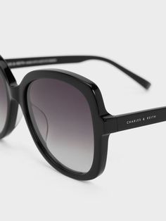 This item is part of our Online Exclusive selection, which consists of unique colourways and designs that are only available for purchase at CHARLESKEITH.COM. Pop these acetate butterfly sunglasses on to make an effortless statement. The bold butterfly silhouette shields the face from the sun and accentuates every eye shape with its oversized design. In classic black, these shades are glamorous but versatile, so it will match with most outfits, from your pool ensembles to everyday outfits. Complete with tinted lenses to block out the glare, they offer eye protection without compromising on style. Butterfly Silhouette, Butterfly Sunglasses, Eye Shape, Charles Keith, Sunglasses & Glasses, Eye Shapes, Eye Protection, Everyday Outfits, Classic Black