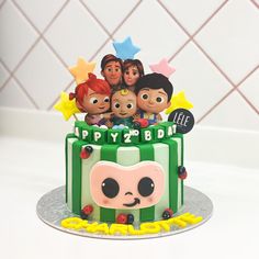 there is a birthday cake with the characters on it