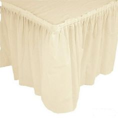 a table with a white cloth draped over it