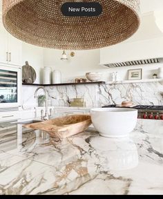 a large bowl sitting on top of a kitchen counter