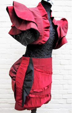 Avant garde runway ruffle bolero with matching (mini) skirt.  Rock chick design and made from scratch by myself. Color is bordeaux red.  The bolero can be worn inside out as well, no seams. Then it is black.  SIZE S.  The bolero has no closure, the skirt has a zipper on the side and has lining.  Measurements: Waist skirt: 77 cm - 30 inch (skirt is made to wear just below waist)  Hips skirt: 99 cm - 39 inch.  Lenght skirt: 39/46 cm - 15.3/18 inch. Bolero armpit to armpit: 43 cm - 17 inch.  Bolero Outfit Rock, Rock Chick, Womens Suits, Red Suit, Clothes Outfit, Bolero Jacket, Womens Clothes, Burgundy Red, Suits For Women