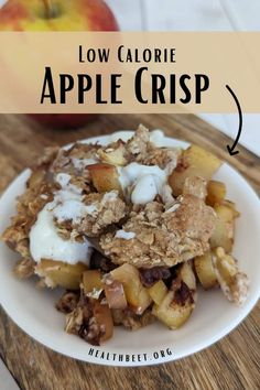 a white plate topped with apple crisp and yogurt