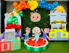 children's birthday party decoration with balloons and toys