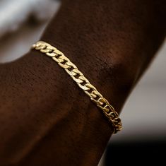 Introducing the Curb Chain Bracelet in 6mm! The same classic design with a bolder feel. This is the perfect piece to accentuate your fit, featuring 18k Yellow Gold links and our signature GLD clasp. Stack this with the Figaro Bracelet in Yellow Gold- 4mm for a dynamic duo. This product is guaranteed for life – GLD will repair or replace the item should you experience any defects in craftsmanship or breakage.    Specifications      - Width: 6mm      - Length: 6", 7", 8", & 9"      - Weight: (Weight can vary +/- 1 gram)               18k Yellow Gold Plated:                        -6": 8 grams                       -7": 8 grams                       -8": 9 grams                       -9": 12 grams Black Men Jewelry, Engraved Bracelets For Him, Figaro Bracelet, Curb Chain Bracelet, Engraved Bracelet, Dynamic Duo, Vermeil Jewelry, Custom Earrings, Drop Necklace