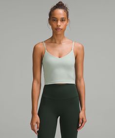 When Feeling Nothing Is Everything. Powered By Nulu Fabric, This Tank With Cami-Inspired Adjustable Straps Is So Weightless And Buttery Soft, All You Feel Is Your Practice. Designed For Yoga. Intended To Provide Light Support For A/b Cups:tight Fit Contours Your Body:cropped Length Is Cut Above The Waist-Perfect With High-Rise Pants:intended For Low-Impact Activities. Built-In Shelf Bra For Added Support And Coverage. Pockets For Optional, Removable Cups. Adjustable Straps. | Lululemon Align™ Cropped Cami Tank Top Light Support, A/B Cup Casual Fitted Lululemon Sports Bra, Lululemon Casual Activewear With Built-in Bra, Lululemon Fitted Top With Light Support, Fitted Lululemon Tops With Light Support, Lululemon Seamless Yoga Tops, Sporty Lululemon Tops For Pilates, Lululemon Top With Built-in Bra For Gym, Casual Lululemon Yoga Tops, Lululemon Sporty Top With Built-in Bra