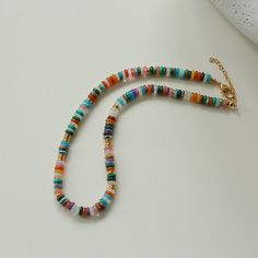 Discover the stunning beauty and versatility of our Natural Stone Colorful Beaded Necklace. Featuring a kaleidoscope of vibrant natural gemstones, this accessory adds a pop of color and authenticity to any outfit. Metal: 18K Recycled Gold Plated on Brass Gemstone:Natural Multi Stone,White Shell Necklace Length:410mm-460mm Weight: 30g White Shell Necklace, Shell Beaded Necklace, Colorful Beaded Necklace, Double Horn Necklace, Simple Pearl Necklace, Shell Beads Necklace, Element Necklace, Pandora Necklace, Gold Chain With Pendant