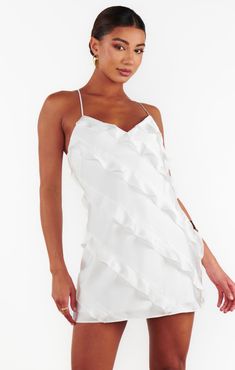 This mini slip dress is the perfect mix of elegance and playfulness. The luxurious satin finish adds a sophisticated touch, while the ruffle detailing enhances its romantic allure, making it ideal for any bridal event. Whether you're celebrating your bachelorette, bridal shower, or engagement party, this dress ensures all eyes will be on you as you’re in the spotlight! Hoco Inspo, Classy Fits, Bridal Event, Mini Slip, Ruffle Mini Dress, In The Spotlight, Mini Slip Dress, All Eyes, All About Eyes