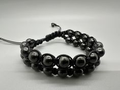 Shungite knitted Bracelet "Vnutrin"EMF Protection,Natural Shungite,Beaded bracelet,Gemstone Bracelet,5mm Round Gemstone Bracelet,shungite  the bracelet is stretchable with a rope mechanism, suitable for both men and women! Shungite is a very powerful stone that we recommend every person has in their home. It is said to be the "miracle stone" and/or "the stone of life." Shungite works to cleanse and align all the particles in the body so that they are open and in alignment with the light. It carries strong purifying, cleansing, and detoxifying properties. It can be used to clear your body of any dysfunctional patterns, which in turn can manifest as negativity, emotional difficulties, or even certain diseases. Shungite is known for its incredible healing and protection properties, including Knitted Bracelet, Shungite Stones, Knit Bracelet, Psychic Protection, Emf Protection, Body Healing, Bracelet Gemstone, Gemstone Beaded Bracelets, Gemstone Bracelet