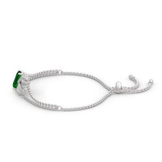 Shimmering with your affection, this bracelet shoots straight to her heart. Crafted in sterling silver, it features a glittering emerald cut stone to bring out it's beauty and sparkle. Additional stones form leaf-shaped design to add more elegance to this bracelet. She'll admire the nature-inspired details of this lovely leaf bracelet.Carat Weight: 2.76 ctStone Size: 8*10 mmNumber of Stones: 1 Stone Shape: RadiantStone Color: Emerald GreenCarat Weight: 0.65 ctStone Size: 1.2,1.1,1,0.8,1.8,1.7,1. Elegant Sterling Silver Bracelets For May Birthstone, Green Sterling Silver Bracelets Fine Jewelry, Silver Emerald Bracelets In Fine Jewelry Style, Green Sterling Silver Bracelets, Fine Jewelry, Silver Emerald Bracelet Fine Jewelry, Luxury Silver Tennis Bracelet With Emeralds, Silver Jewelry With Adjustable Chain For May Birthstone, Adjustable Sparkling Fine Jewelry, Emerald Bracelets For Anniversary, May Birthstone