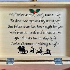 a wooden box with a poem written on the front and back of it, decorated with santa's sleigh