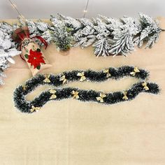 christmas decorations are displayed on a table