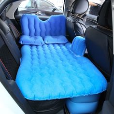 an inflatable car seat is shown with the back seats down