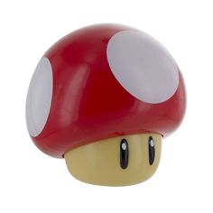 Model: PP4017NNV4_NA Plastic Desk Light Dimensions 13 x 13 x 12 cm Super Mario Mushroom Design Officially Licensed Merchandise NINTENDO - Super Mario Mushroom Light with Sound. Officially licensed Nintendo merchandise. This instantly recognisable Mushroom design makes a great gift for lovers of the Super Mario franchise as well as fans of retro gaming in general. As you switch on the Mushroom Light it makes the officially licensed 'Level-Up' sound and glows with its trademark happy eyes. Feel the vibe of the iconic retro games and treat yourself with this wee gift. Super Mario Toad, Toad Mushroom, Mushroom Nightlight, Mario Toad, Super Mario Mushroom, Mushroom Light, Happy Eyes, Mushroom Table Lamp, Mushroom Lights