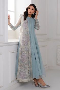 Introducing our stunning Light Blue Chiffon Silk Suit Anarkali Dress, complete with an embroidered net dupatta and a grip silk trouser. Create a head-turning look with this elegant 3-piece set, including the top, trouser, and dupatta, along with accompanying accessories. Elevate your style with the luxurious embroidered chiffon fabric. Top Fabric: Chiffon Dupatta Fabric: Embroidered Net Trouser Fabric: Grip silk Top Length: 50" Sleeves Length: 22" Bottom Length: 38" Condition: New Occasion: Festive Touch and Feel: Soft and Comfortable Care: Dry Clean Note: Slight variation in color is possible Desi Outfits, Pakistani Fancy Dresses, Pakistani Dresses Casual, Beautiful Pakistani Dresses, Fancy Dresses Long, Simple Pakistani Dresses