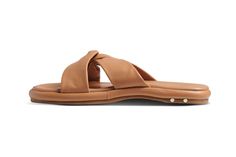 Step into the world of cute cushiness with our PICULET leather slide sandal, meticulously designed to wrap your feet in luxurious comfort and modern styling. At every touchpoint, we've prioritized plushness. The insole boasts a luxurious leather wrapping that encases thick memory foam cushioning, ensuring each step is dreamy. Even the side of the sole is thoughtfully padded and then elegantly enveloped in soft, supple leather. The upper straps, fashioned from insanely soft leather, are ingenious Modern Leather Beach Slippers, Luxury Leather Summer Slippers, Luxury Leather Slides, Products Packaging, Honey Color, Winter Lookbook, Clog Heels, Shearling Boots, Platform Slides