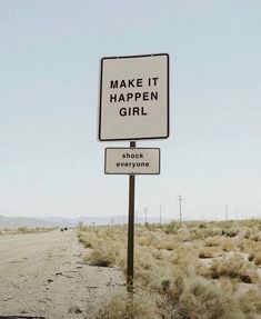 a sign that says make it happen girl and shock everyone on the side of the road