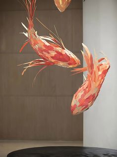 an artistic sculpture made out of folded paper