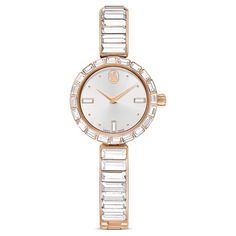 Elegance is amplified with crystals in this beautiful jewelry-inspired timepiece. The 25mm stainless steel design has a rose gold-tone finish and is encircled by a bezel with 20 baguette-cut clear crystals, while a single crystal is set within the crown. Baguette-cut crystals also highlight three index markers on the light gray dial, which also features a swan logo at 12 o’clock. Around the wrist, the bangle-style bracelet is adorned with 16 baguette-cut crystals and is fully adjustable for a co Swarovski Watch, Rose Watch, Swan Logo, Stackable Ring Sets, Bracelet Rose Gold, Pink Watch, Bangle Watches, Rose Gold Watches, Bangles Style