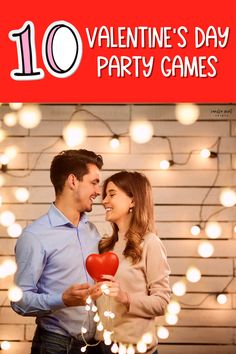 a man and woman standing next to each other in front of string lights with the words 10 valentine's day party games