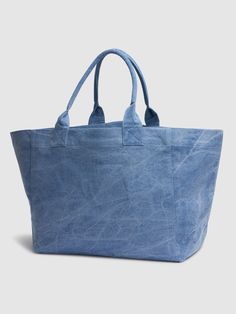 Height: 34cm Width: 65cm Depth: 22cm. Double top handles. No closure. Embroidered front panel. Logo details. Stonewashed coloring may vary Denim Blue Cotton Shoulder Bag With Double Handle, Denim Blue Canvas Shoulder Bag For Shopping, Weekend Cotton Bag With Double Handles, Summer Canvas Bags With Rolled Handles, Denim Blue Canvas Shopping Bag, Denim Blue Cotton Shopping Bag, Blue Cotton Bags With Leather Handles, Denim Blue Canvas Tote Bag, Denim Blue Shopping Bag With Double Handle