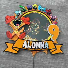 a clock with the name alonna on it and an image of a cartoon character