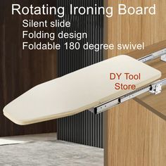 a white ironing board sitting on top of a wooden cabinet