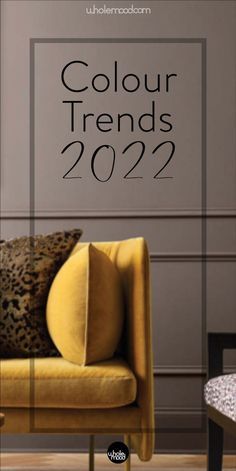 a yellow couch sitting in front of a wall with the words, color trend 2020