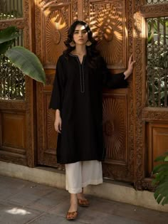 Black outfit, Black kurta with plazzo,new pakistani style kurta set for women suragi Elegant Black Lawn Suit With Straight Kurta, Black Unstitched Cambric Lawn Suit, Unstitched Black Cambric Lawn Suit, Black Cambric Lawn Suit With Straight Kurta, Black Cotton Lawn Suit For Work, Black Cotton Long Sleeve Kurta, Black Cambric Lawn Suit For Eid, Elegant Black Cotton Lawn Suit, Elegant Black Lawn Suit With Long Sleeves