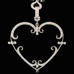 We dare say this is one of the prettiest hearts we've seen in jewelry. Large and open, this white gold pendant is covered with 115 dazzling white diamonds! The best gift you can give at the holidays is love... and this necklace says it all! 😍💕 Luxury Sterling Silver Open Heart Diamond Necklace, Luxury Exquisite Filigree Necklaces, Luxury Open Heart Diamond Jewelry, Diamond Heart Necklace, Filigree Heart, Heart Necklace Diamond, White Gold Pendant, Vintage Necklaces, Open Heart