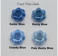 four different colors of flower hair clips with names in english and spanish on white background