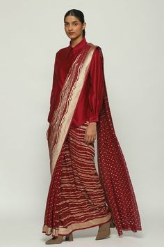 Wine silk saree with all metallic woven tribal lines and polka dot pattern. - Aza Fashions Elegant Bandhani Print Sets For Festivals, Festive Pre-draped Saree With Bandhani Print, Elegant Bandhani Print Sets With Traditional Drape, Festive Designer Bandhani Print Pre-draped Saree, Traditional Bandhani Print Saree For Reception, Elegant Bandhani Print Traditional Wear For Diwali, Elegant Bandhani Print Sets For Diwali, Festive Silk Pre-draped Saree With Bandhani Print, Elegant Bandhani Traditional Wear For Diwali