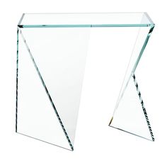 a glass table with an angled design on the top and bottom, against a white background