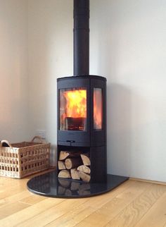 a wood burning stove in the corner of a room