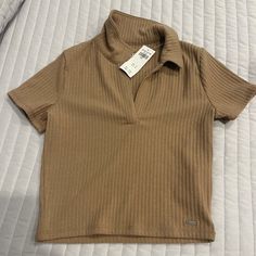 New With Tags Baby Tee. Cute Collared Tops For Fall, Cute Ribbed Cotton Tops, Ribbed Cotton Collared Tops, Casual Brown Crop Top, Cute Ribbed Tops, Cute Fitted Collared Top, Brown Ribbed Short Sleeve Top, Basic Brown Tops For Spring, Cute Ribbed Tops For Fall