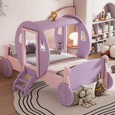 a child's pink and purple bed with a horse drawn carriage on the bottom