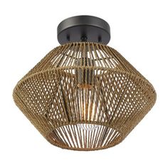 a light that is on top of a ceiling fixture with wicker covering it's face